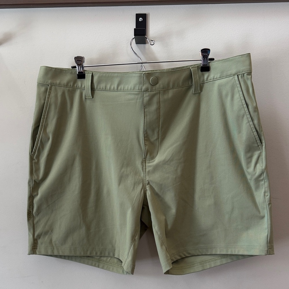 RHONE 7” Commuter  Sage Green Flat-Front Performance Shorts